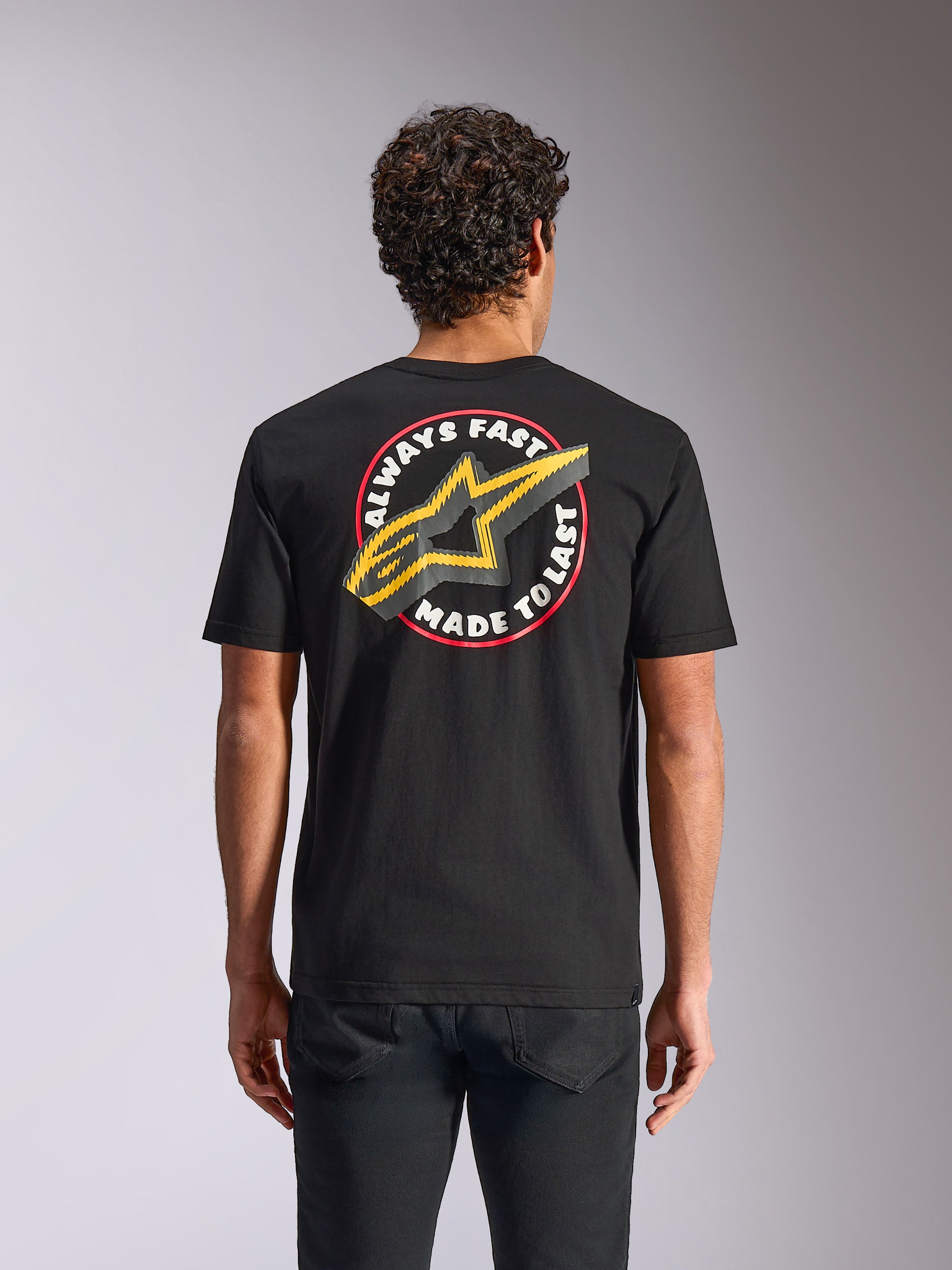 Alpinestars Aorbit CSF Tee, t-shirt a maniche corte, nera, grafica "Always Fast Made to Last" con logo a stella giallo sul retro, streetwear casual motorsport