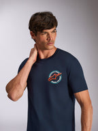Alpinestars T-shirt Aorbit CSF, t-shirt a maniche corte, blu navy, grafica circolare sul petto con logo a stella arancione e scritta Always Fast Made to Last, streetwear casual motorsport