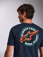 Alpinestars Aorbit CSF Tee, t-shirt a maniche corte, blu navy, vista posteriore con grafica Always Fast Made to Last e logo a stella arancione, streetwear casual motorsport