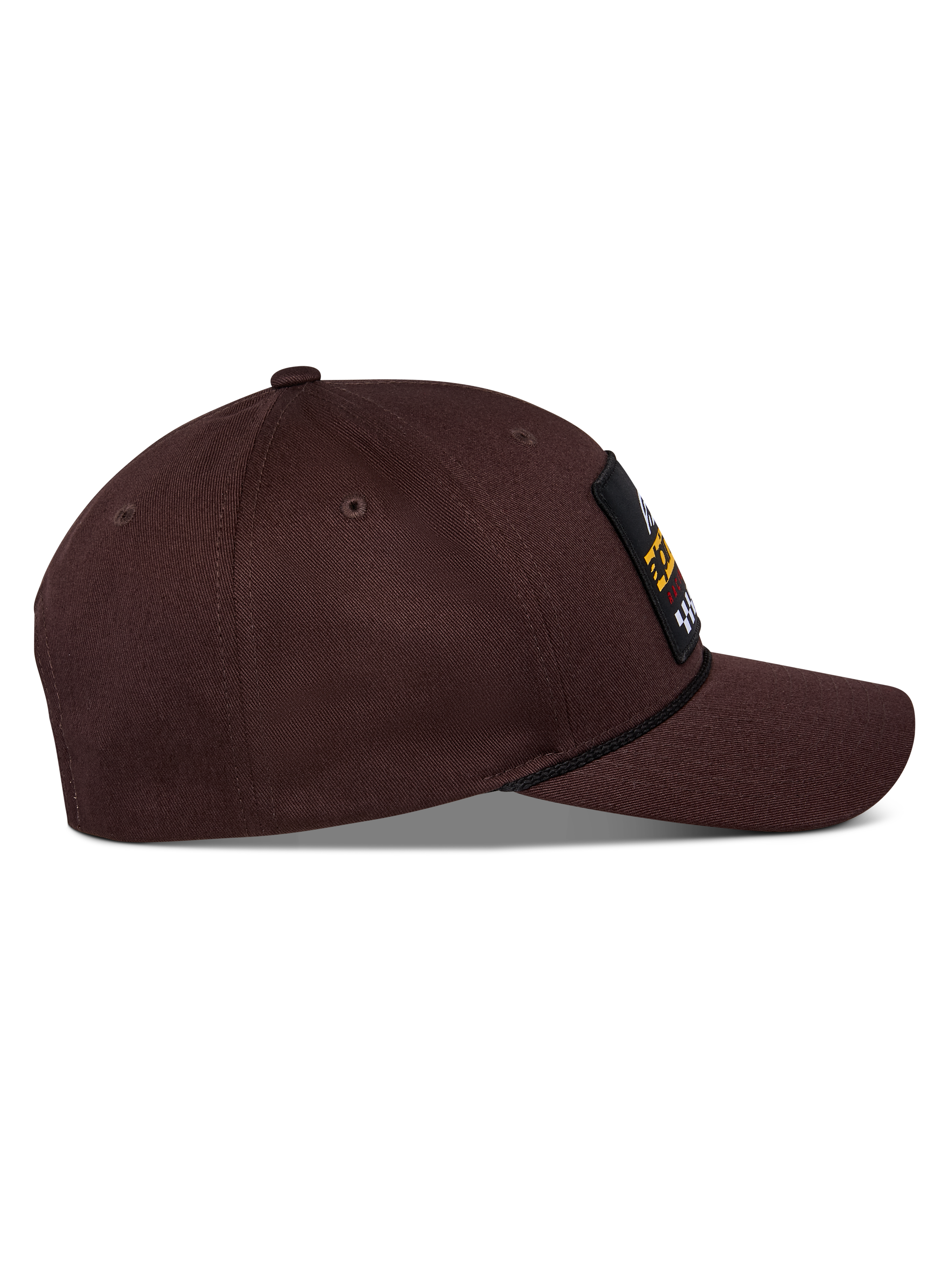 Cappello Alpinestars Matrix Snapback, marrone scuro, vista laterale con visiera curva, corona strutturata e toppa ricamata frontale con dettaglio in cordino, copricapo casual ispirato al motorsport