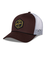 Cappellino Alpinestars Hexeon Trucker, marrone e bianco, visiera curva con parte anteriore strutturata marrone scuro e retro in rete bianca, toppa esagonale nera frontale con logo giallo, logo ricamato laterale, stile classico trucker
