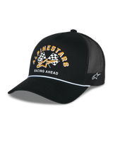 Alpinestars Finisher Trucker Hat, black trucker cap with breathable mesh back, curved bill with white rope accent, features front graphic with yellow Alpinestars lettering and checkered flags, side embroidered star logo, casual motorsport-inspired headwear