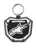 Alpinestars Portachiavi Plate, portachiavi stampato in 3D, nero e bianco, caratterizzato dalla grafica Astars MX con logo e testo bianchi, anello a scatto in metallo argentato, accessorio ispirato al motorsport