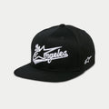 Alpinestars Los Angeles Hat, cappello snapback con visiera piatta, nero e bianco, ricamo 3D in carattere sportivo con logo Astars, corona strutturata, streetwear casual ispirato al motorsport