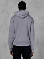 Alpinestars Essentials Ageless Hoodie, pile grigio argento, vista posteriore, design pullover minimalista con cappuccio e polsini a coste, streetwear casual ispirato al mondo del motorsport
