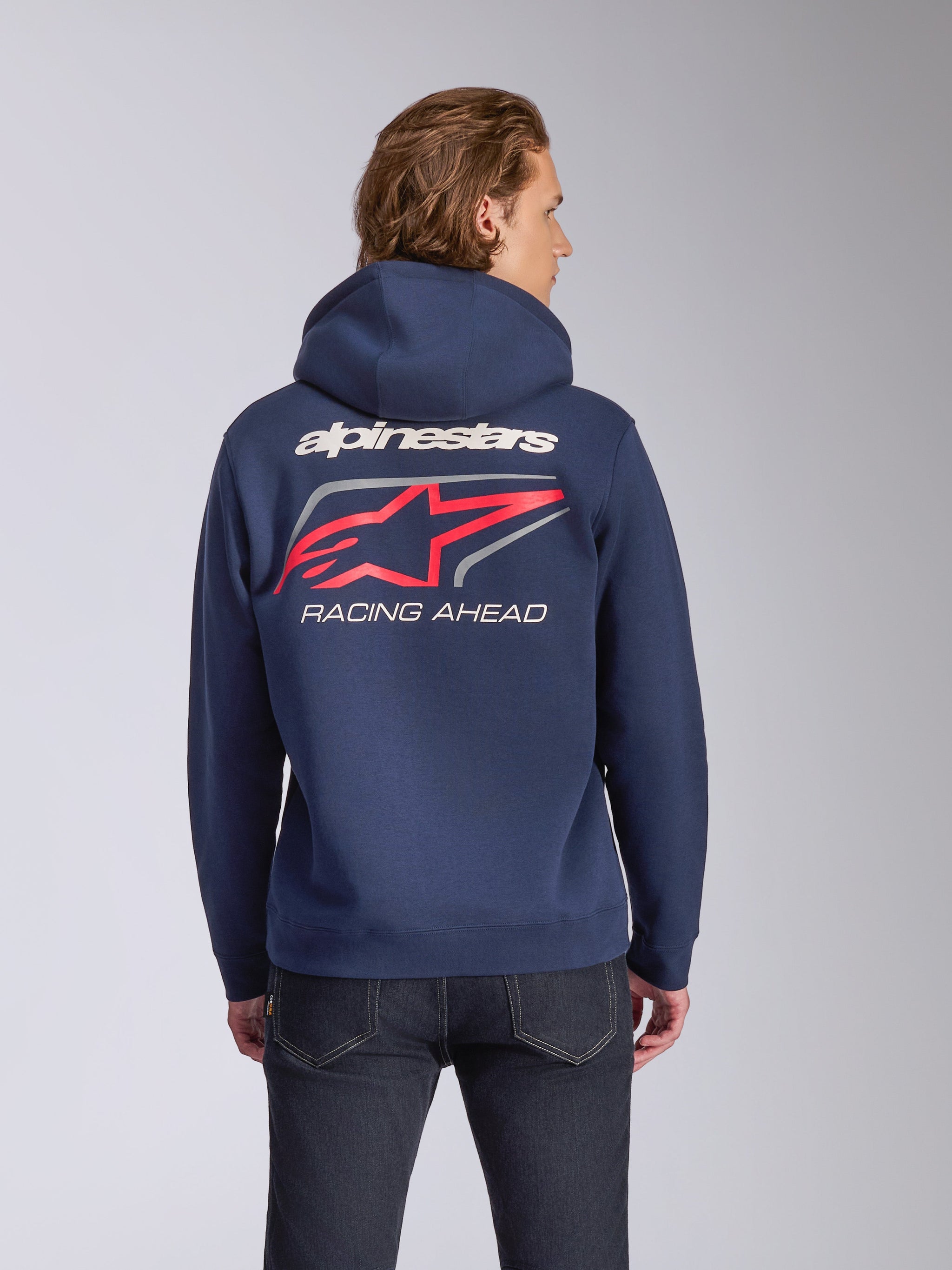 Felpa con cappuccio Alpinestars Formulation, blu navy, vista posteriore con marchio Alpinestars bianco, grande logo A-stars rosso con accenti grigi e scritta 'RACING AHEAD', streetwear casual motorsport