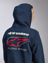 Felpa con cappuccio Formulation Alpinestars, pile blu navy con zip frontale, vista posteriore con cappuccio sollevato e grande grafica posteriore con marchio Alpinestars bianco, logo a stella rosso e scritta 'RACING AHEAD', streetwear casual ispirato al motorsport