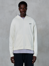 Alpinestars Essentials Ageless Zip Hoodie, felpa casual con zip color bianco sporco, cappuccio con coulisse, polsini e orlo a costine, logo discreto, abbigliamento lifestyle premium ispirato al motorsport