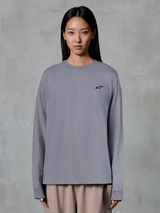 Alpinestars Essentials Ageless LS Tee, maglia a maniche lunghe, argento, con un piccolo logo a stella nero sul petto, vestibilità rilassata, cotone organico di alta qualità, streetwear casual ispirato al motorsport
