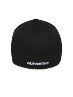 Alpinestars Corp Shift Multi Hat, nero, vista posteriore con logo ricamato piatto bianco alla base, costruzione elasticizzata con retro flessibile, copricapo casual ispirato al motorsport