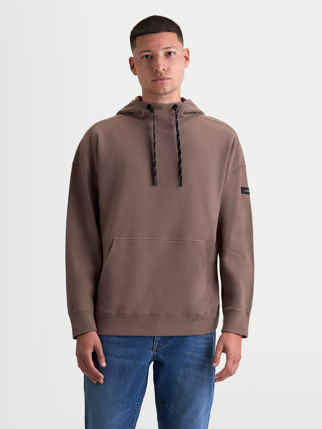 Alpinestars Felpa con cappuccio Camino Textured Oversized, felpa sportswear unisex, marrone taupe, tessuto in pile twill testurizzato con collo alto e tasca a marsupio, ricamo Astars e stile casual motorsport