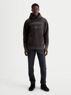 Alpinestars Felpa con cappuccio Infinite Washed Oversized, felpa da uomo in pile nero effetto snow-wash, vestibilità oversize, tasca a marsupio e loghi ricamati sul petto, stile sportswear casual per il tempo libero.