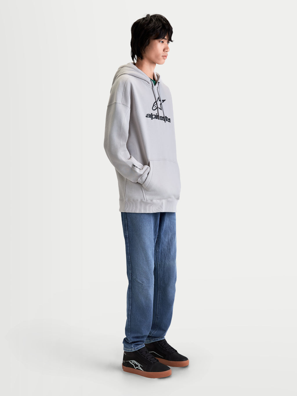 Alpinestars Felpa con cappuccio Prelude Oversized, felpa sportswear da uomo, grigio cemento con logo nero a rilievo, vestibilità oversize rilassata e tasca a marsupio, stile casual quotidiano