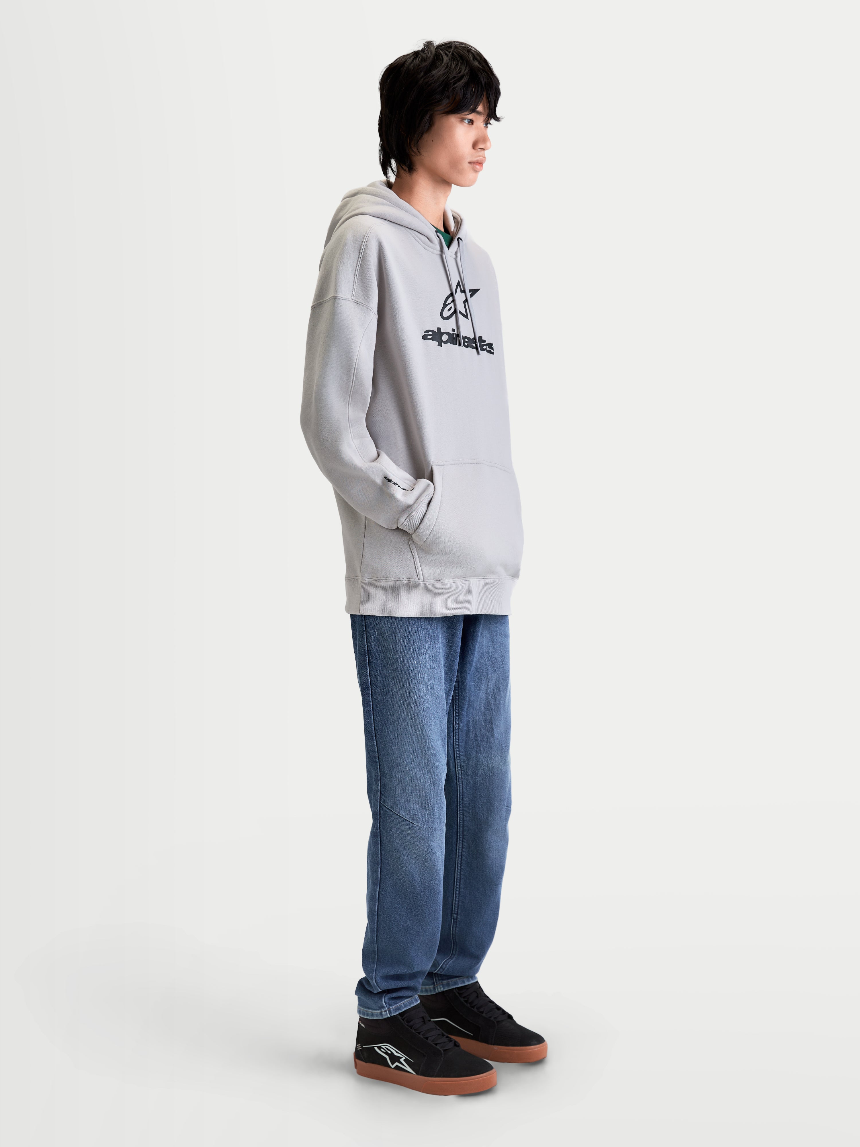 Alpinestars Felpa con cappuccio Prelude Oversized, felpa sportswear da uomo, grigio cemento con logo nero a rilievo, vestibilità oversize rilassata e tasca a marsupio, stile casual quotidiano