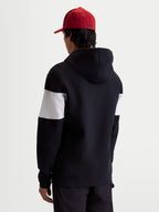 Alpinestars felpa con cappuccio Cubic, felpa in pile sportswear, nera e bianca, design con maniche a blocchi di colore, misto cotone e poliestere riciclato, vista posteriore su modello per uno stile casual quotidiano