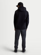 Alpinestars Felpa con cappuccio Velocifier, pile pullover da uomo sportswear, nera, vista posteriore su modello con loghi Alpinestars bianchi sulle spalle, misto cotone e poliestere riciclato
