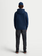 Alpinestars Felpa con cappuccio Race Wordmark, felpa sportswear in pile per uso casual quotidiano, vista posteriore su modello, blu, realizzata in misto cotone e poliestere riciclato con cappuccio autofoderato e orlo a coste.
