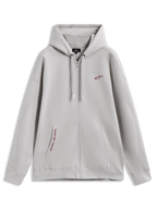 Alpinestars Pioneer Oversized Hoodie, felpa sportiva grigio cemento con zip, dettagli rossi e tasca a marsupio.