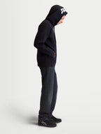Alpinestars Felpa con cappuccio Pioneer Oversized, felpa sportswear da uomo, nera con dettagli bianchi ricamati sul cappuccio, vestibilità oversize, zip Vislon e tasca a marsupio, ideale per un look casual quotidiano