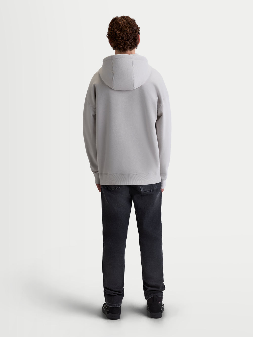 Alpinestars felpa con cappuccio Entity Oversized, felpa in pile sportswear da uomo con zip integrale, grigio cemento, vista posteriore con vestibilità oversized rilassata, cappuccio autofoderato e bordo a costine, abbigliamento lifestyle premium