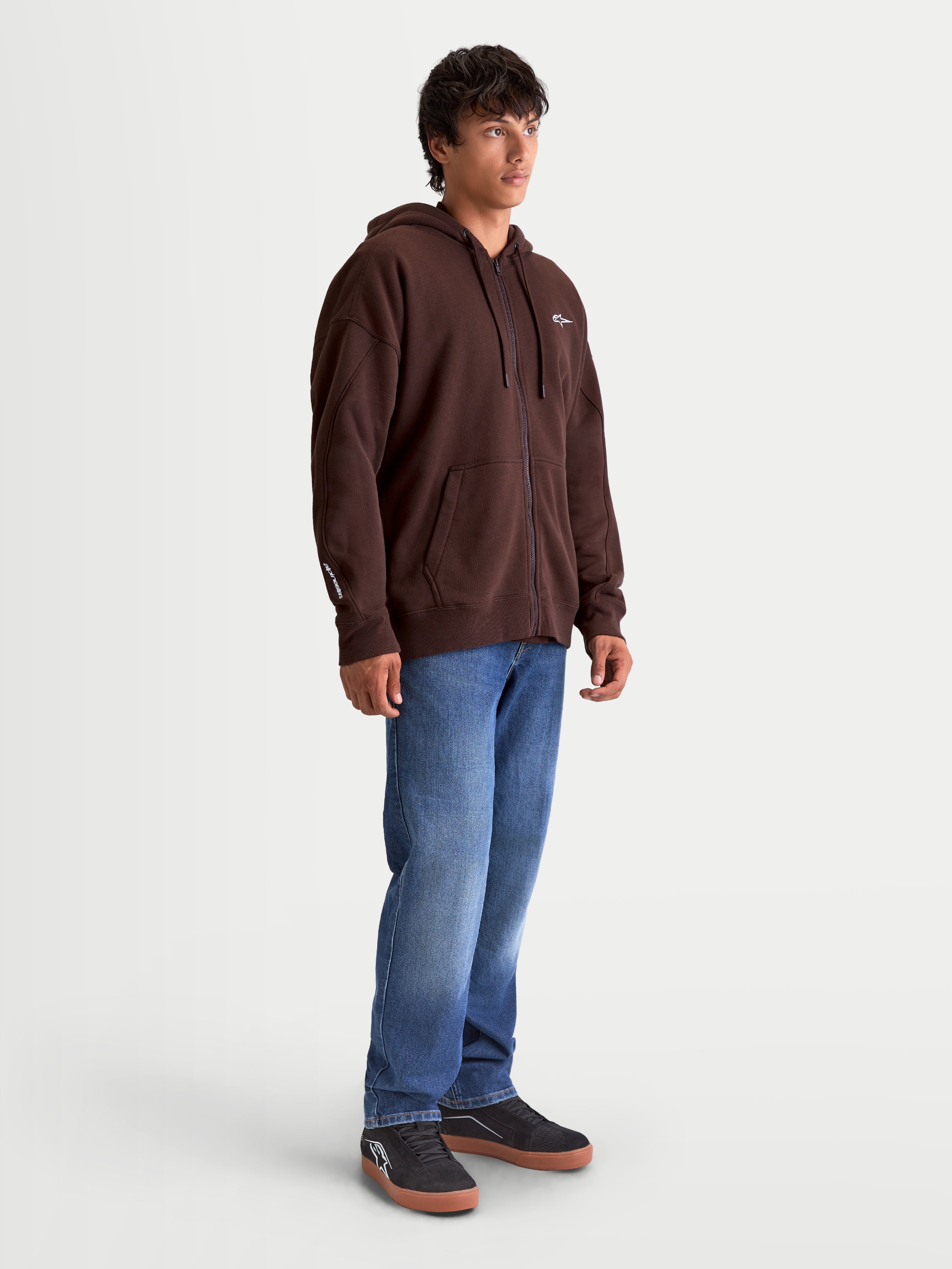 Alpinestars Felpa con cappuccio Entity Oversized, felpa da uomo in pile con zip, marrone, vestibilità ampia, tasca a marsupio e logo Astars ricamato sul petto e sulla manica, stile casual motorsport.