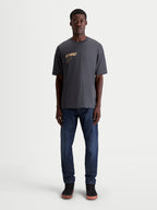 Alpinestars Maglietta Chalk Oversized CSF, t-shirt sportswear a maniche corte da uomo, grigio antracite con grafica frontale Astars color sabbia, vestibilità oversize rilassata in misto cotone e poliestere