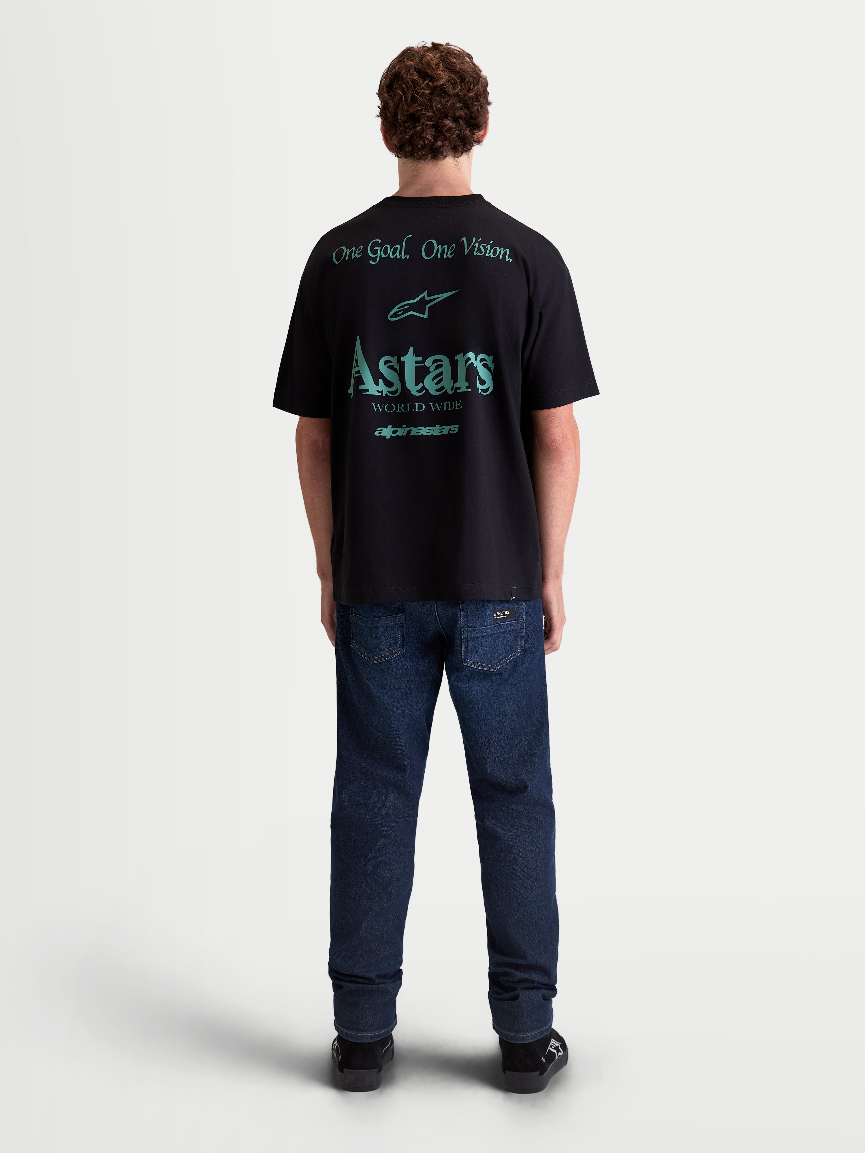 Alpinestars Maglietta Post Oversized CSF, maglietta a maniche corte sportswear unisex, nero con grafiche verde acqua sulla schiena, logo Astars World Wide e One Goal. One Vision., vestibilità oversize, misto cotone morbido