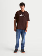Alpinestars Maglietta Prelude Oversized CSF, maglietta a maniche corte da uomo, marrone, logo Astars e scritta bianchi sul petto, vestibilità oversized, stile casual sportswear