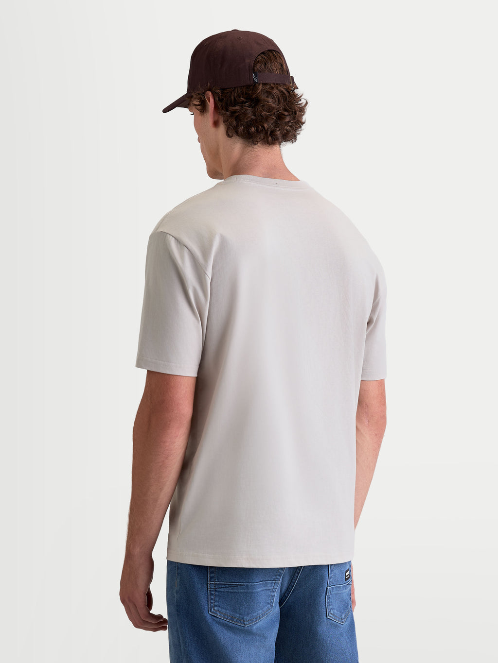 Alpinestars Maglietta Elliptogrit CSF, maglietta da uomo a maniche corte, vista posteriore su modello, grigio cemento, misto cotone premium, stile sportswear casual per l'uso quotidiano