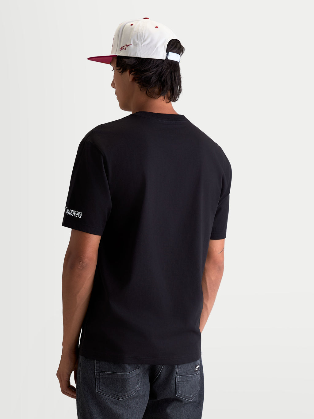Alpinestars Maglietta P1 CSF, maglietta a maniche corte sportswear, nera, vista posteriore con piccolo logo sulla manica, stile motorsport casual.