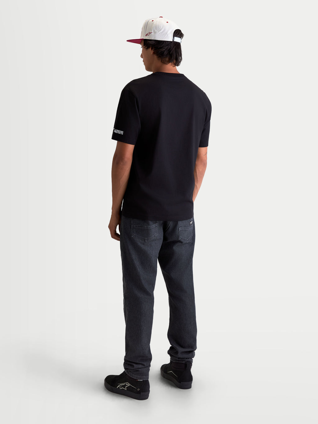 Alpinestars Maglietta P1 CSF, maglietta a maniche corte sportswear da uomo, nera, vista posteriore, in misto cotone e poliestere, stile casual motorsport