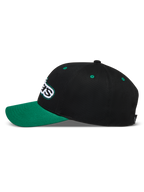 Alpinestars Retro Snapback Cappello nero e verde, profilo laterale con visiera curva e logo Astars ricamato.
