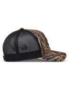 Alpinestars Thicket Realtree Cappellino Trucker mimetico e nero, vista laterale con visiera curva e rete traspirante.