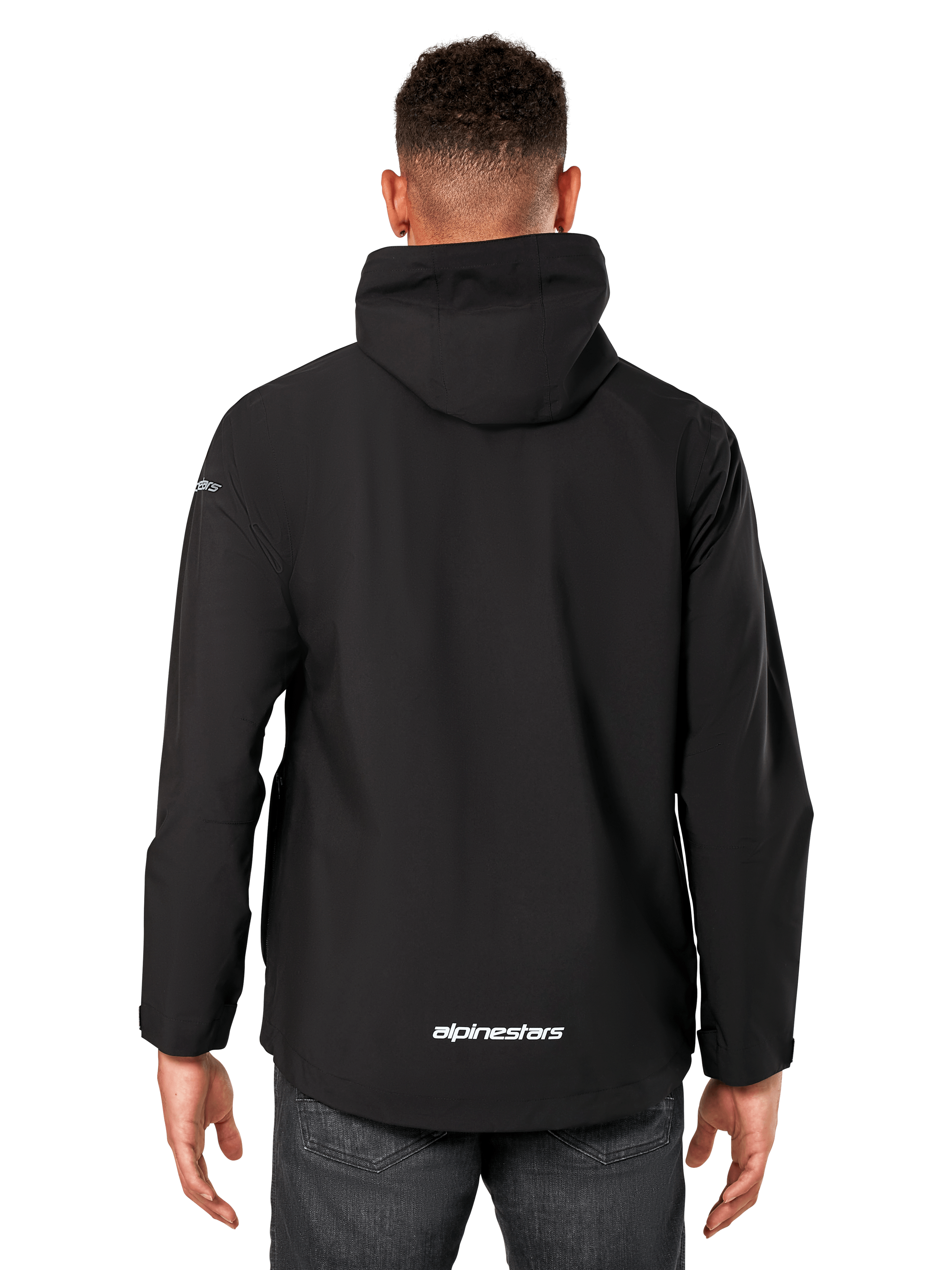Giacca antipioggia Alpinestars Kascade, giacca impermeabile da uomo, nero, vista posteriore con cappuccio fisso e logo Alpinestars sulla parte inferiore della schiena, abbigliamento sportivo impermeabile casual