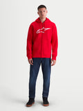 Alpinestars felpa con cappuccio Ageless Zip V3, felpa sportswear da uomo in pile con zip frontale, rossa con grande logo bianco sul petto, vista frontale su modello.