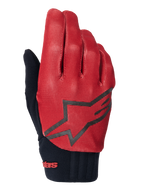 Guanti Alpinestars A-Dura, guanti da ciclismo MTB, arancione scuro e nero, parte superiore con trama a griglia, grande logo a stella nero, polsino in neoprene nero con marchio rosso, progettati per aderenza e prestazioni in mountain bike