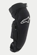 Protezione ginocchio/tibia Alpinestars Vector Pro, nero, con logo Alpinestars bianco sul ginocchio, pannello frontale testurizzato resistente all'abrasione, cinghie a strappo regolabili, attrezzatura protettiva traspirante per MTB