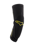 Alpinestars Paragon Plus Knee Protectors, ginocchiere da mountain bike, nero con loghi giallo acido, design tubolare a calza con imbottitura integrata, rete traspirante e tessuto testurizzato resistente