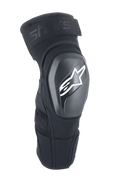 Ginocchiere Alpinestars A-Impact Plasma Elite Shield, nere con logo a stella bianco, guscio esterno rigido in TPU, tessuto mesh con cinturino superiore regolabile, design ergonomico pre-curvato, protezione per MTB e fuoristrada