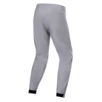 Pantaloni impermeabili Alpinestars A-Dura, pantaloni da MTB, grigio titanio, vista posteriore, con gambe affusolate e polsini elastici neri, design tecnico minimalista per mountain bike