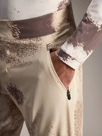 Pantaloncini Alpinestars A-Dura Ride Sand Camo, tasca laterale con zip e tessuto MTB elasticizzato in 4 direzioni.