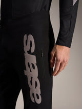 Alpinestars A-Supra Elite Pantaloni neri con grande scritta astars grigia verticale e tasca con zip per MTB racing.