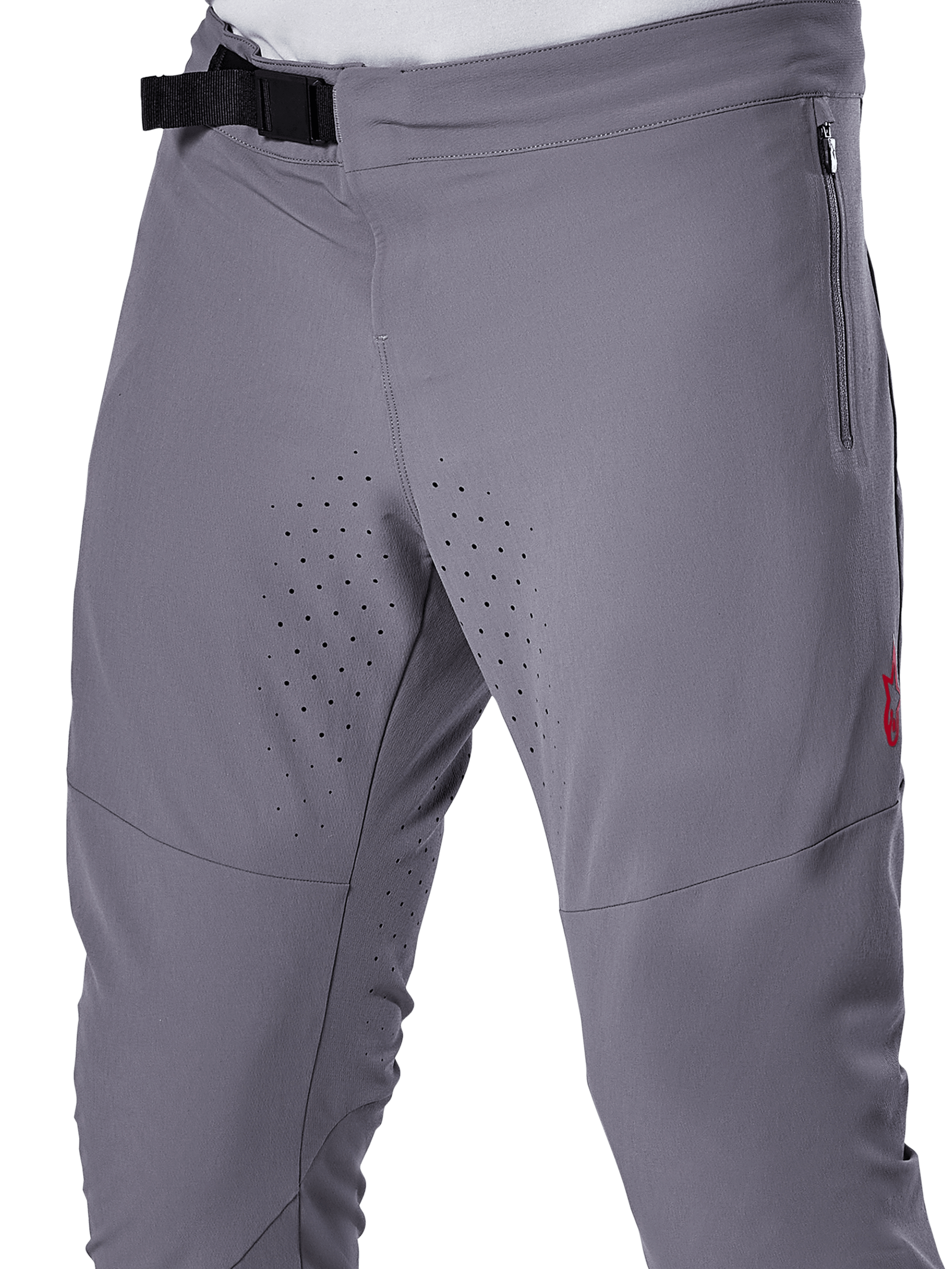 Pantaloni Alpinestars A-Aria Elite, pantaloni da ciclismo MTB, grigio scuro, vista ravvicinata con chiusura a fibbia magnetica, tasca laterale con zip e perforazioni laser per la ventilazione sull'interno coscia per prestazioni nel trail riding.