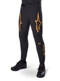 Alpinestars A-Supra Race Pants, pantaloni da corsa MTB neri con grafiche a stella arancioni, ventilazione traforata al laser e chiusura a cricchetto in vita, vestibilità slim performance per ciclismo fuoristrada