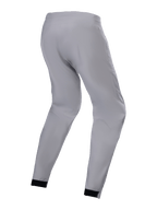 Alpinestars Woman Stella A-Dura Waterproof Pant, grigio titanio, vista laterale posteriore, pantaloni tecnici da MTB con polsini elasticizzati neri e vestibilità affusolata, progettati per il trail riding in condizioni di bagnato