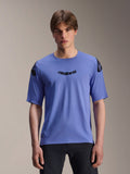 Alpinestars A-Aria Polartec Elite Jersey, maglia MTB a maniche corte, Baja Blue, indossata da un modello, con scritta 'astars' nera sul petto e loghi sulle spalle, abbigliamento tecnico da trail riding.