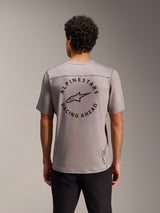 Maglia grigia A-Dura Air a maniche corte con logo Alpinestars Racing Ahead sul retro in mesh traspirante.