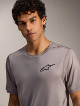 Alpinestars A-Dura Air Maglia grigia a maniche corte in mini-mesh con logo Astars nero sul petto.
