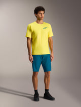 Pantaloncini Alpinestars A-Dura Ride verde-blu e maglia gialla, abbigliamento tecnico da mountain bike per uomo.