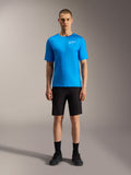 Pantaloncini Alpinestars A-Dura Ride neri e maglia blu acceso, abbigliamento MTB performante per ciclismo.